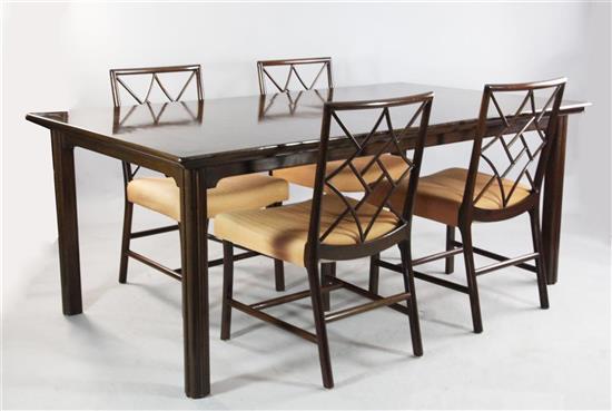 A mid to late 20th century mahogany extending dining table and ten chairs, extends to 7ft 7in. x 3ft 6in. H.2ft 5in.